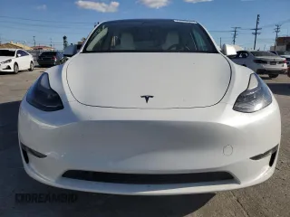 2024 Tesla Model Y Long Range with VIN 7SAYGDEE6RA261884, listed as a Copart auction lot 47639025 with 23,377 mi miles and Salvage Title. Bid and sale history available at DreamBid. Image 5.