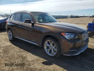 2015 BMW X1 xDrive28i z VIN WBAVL1C5XFVY35610, wystawiony jako Copart lot #54063125 z przebiegiem 115 279 mil mil oraz Szkoda całkowita • Salvage title. Historia ofert i sprzedaży dostępna na DreamBid. Obrazek 4.