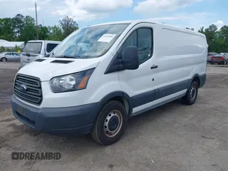 2016 Ford Transit Cargo z VIN 1FTYE1ZM9GKB14741, wystawiony jako IAAI lot #42165906 z przebiegiem 162 976 mil mil oraz . Historia ofert i sprzedaży dostępna na DreamBid. Obrazek 17.