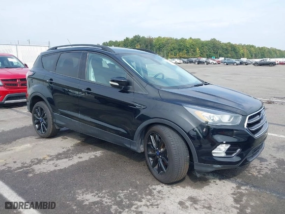 2017 Ford Escape Titanium with VIN 1FMCU0J90HUF10332, listed as a IAAI auction lot 37586869 with 49,887 mi miles. Bid and sale history available at carsss.com. Image 1.