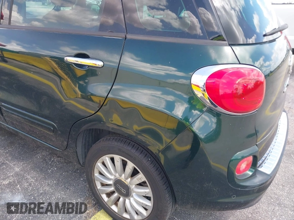 2014 FIAT 500L Easy with VIN ZFBCFABH0EZ014538, listed as a IAAI auction lot 42552809 with 97,225 mi miles and . Bid and sale history available at DreamBid. Image 6.