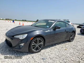 2015 Scion FR-S z VIN JF1ZNAA12F8704724, wystawiony jako Copart lot #57285175 z przebiegiem 118 111 mil mil oraz Czysty tytuł • Clean title. Historia ofert i sprzedaży dostępna na DreamBid. Obrazek 1.