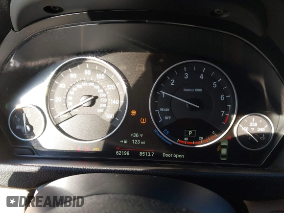 2018 BMW 3 Series 320i xDrive with VIN WBA8E5G57JNU47770, listed as a IAAI auction lot 41409122 with 62,198 mi miles. Bid and sale history available at carsss.com. Image 7.