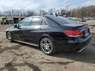 2014 Mercedes-Benz E 550 Sport with VIN WDDHF9BB4EB041639, listed as a Copart auction lot 46950315 with 128,719 mi miles and Clean Title. Bid and sale history available at DreamBid. Image 2.