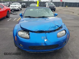 2006 Mazda MX-5 Miata Touring z VIN JM1NC25FX60102209, wystawiony jako IAAI lot #41940771 z przebiegiem 165 003 mil mil oraz . Historia ofert i sprzedaży dostępna na DreamBid. Obrazek 11.