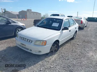 2002 Hyundai Accent GL with VIN KMHCG45C92U347708, listed as a IAAI auction lot 42137086 with 73,271 mi miles. Bid and sale history available at carsss.com. Image 2.