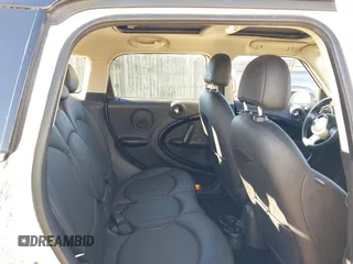 2014 MINI Countryman S z VIN WMWZC5C57EWP38396, wystawiony jako IAAI lot #41027727 z przebiegiem 147 260 mil mil oraz . Historia ofert i sprzedaży dostępna na DreamBid. Obrazek 8.