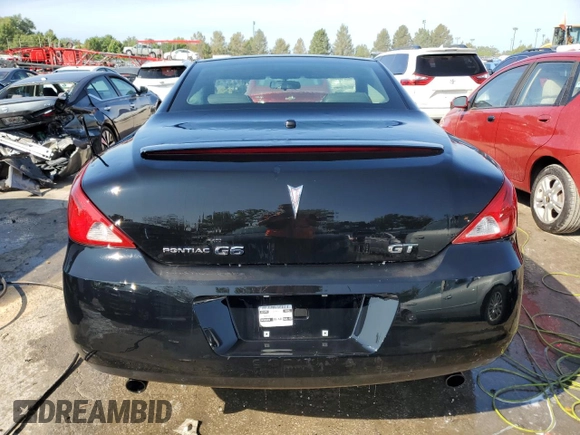 2007 Pontiac G6 GT with VIN 1G2ZH361974158846, listed as a Copart auction lot 65012714 with 64,038 mi miles and Salvage Title. Bid and sale history available at carsss.com. Image 6.