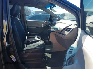 2012 Toyota Sienna SE with VIN 5TDXK3DC9CS179896, listed as a IAAI auction lot 41672616 with 216,638 mi miles. Bid and sale history available at carsss.com. Image 5.