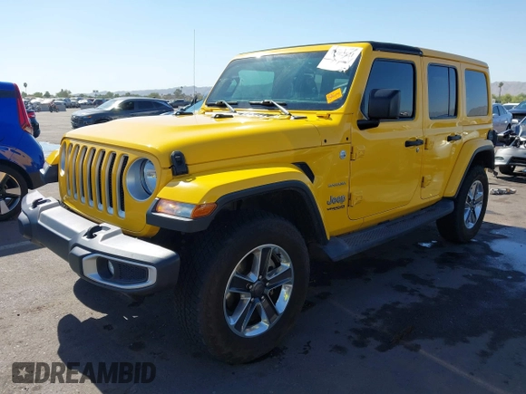 2018 Jeep Wrangler Unlimited Sahara z VIN 1C4HJXEN3JW306282, wystawiony jako IAAI lot #42302821 z przebiegiem 70 204 mil mil oraz . Historia ofert i sprzedaży dostępna na DreamBid. Obrazek 2.