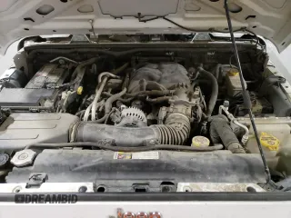 2012 Jeep Wrangler Sport z VIN 1C4AJWAG7CL256428, wystawiony jako Copart lot #66923465 z przebiegiem 36 478 mil mil oraz Szkoda całkowita • Salvage title. Historia ofert i sprzedaży dostępna na DreamBid. Obrazek 12.