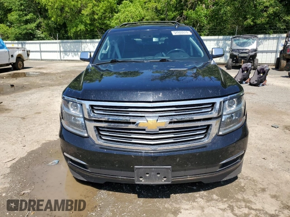 2018 Chevrolet Tahoe Premier with VIN 1GNSKCKC1JR133625, listed as a Copart auction lot 54900974 with 130,921 mi miles and Salvage title. Bid and sale history available at DreamBid. Image 5.