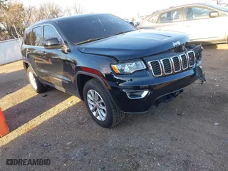 2021 Jeep Grand Cherokee Laredo X with VIN 1C4RJEAG9MC511837, listed as a IAAI auction lot 41386461 with 52,184 mi miles. Bid and sale history available at carsss.com. Image 1.