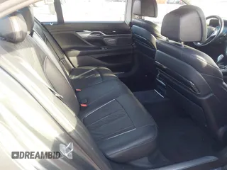 2018 BMW 7 Series 740i with VIN WBA7E2C55JB214987, listed as a IAAI auction lot 41733790 with 96,738 mi miles. Bid and sale history available at carsss.com. Image 8.