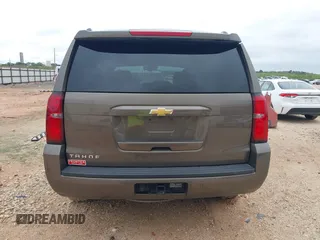 2015 Chevrolet Tahoe LT z VIN 1GNSCBKC2FR685780, wystawiony jako IAAI lot #42354130 z przebiegiem 101 617 mil mil oraz . Historia ofert i sprzedaży dostępna na DreamBid. Obrazek 16.