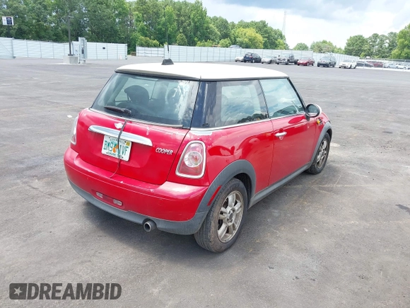 2012 MINI Hardtop with VIN WMWSU3C51CT255374, listed as a IAAI auction lot 42638610 with 165,103 mi miles and . Bid and sale history available at DreamBid. Image 4.