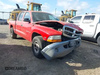 2000 Dodge Dakota Sport with VIN 1B7GL2AN0YS705134, listed as a IAAI auction lot 41997957 with 219,659 mi miles. Bid and sale history available at carsss.com. Image 1.