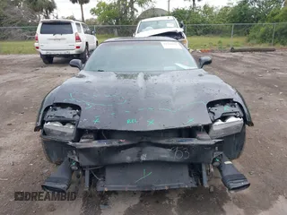 2004 Chevrolet Corvette with VIN 1G1YY22G345100922, listed as a IAAI auction lot 41726582 with 107,594 mi miles and . Bid and sale history available at DreamBid. Image 13.