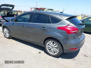 2018 Ford Focus Titanium with VIN 1FADP3N28JL232120, listed as a IAAI auction lot 42544070 with 28,661 mi miles and . Bid and sale history available at DreamBid. Image 3.