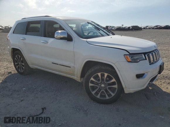 2017 Jeep Grand Cherokee Overland with VIN 1C4RJFCG9HC633011, listed as a Copart auction lot 48596125 with 0 mi miles and Salvage Title. Bid and sale history available at carsss.com. Image 4.