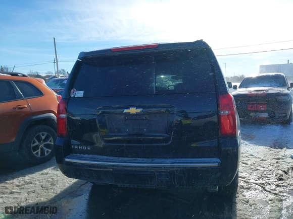 2016 Chevrolet Tahoe LTZ with VIN 1GNSKCKCXGR274864, listed as a IAAI auction lot 41428433 with 117,365 mi miles. Bid and sale history available at carsss.com. Image 16.