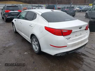 2014 Kia Optima LX z VIN KNAGM4A78E5484514, wystawiony jako IAAI lot #41227492 z przebiegiem 118 531 mil mil oraz . Historia ofert i sprzedaży dostępna na DreamBid. Obrazek 3.