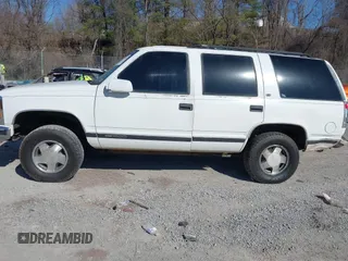 1999 GMC Yukon with VIN 1GKEK13R8XJ763098, listed as a IAAI auction lot 41753745 with 209,451 mi miles. Bid and sale history available at carsss.com. Image 15.