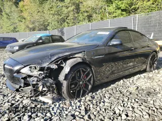 2014 BMW 6 Series 650i xDrive with VIN WBA6B4C54ED371520, listed as a Copart auction lot 75107784 with 136,077 mi miles and Salvage Title. Bid and sale history available at carsss.com. Image 1.