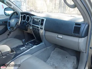 2005 Toyota 4Runner SR5 with VIN JTEBU14R450068462, listed as a IAAI auction lot 42048628 with 205,722 mi miles. Bid and sale history available at carsss.com. Image 5.