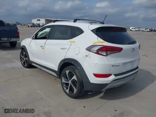 2017 Hyundai Tucson Value with VIN KM8J33A27HU564306, listed as a IAAI auction lot 40983257 with 53,590 mi miles. Bid and sale history available at carsss.com. Image 3.