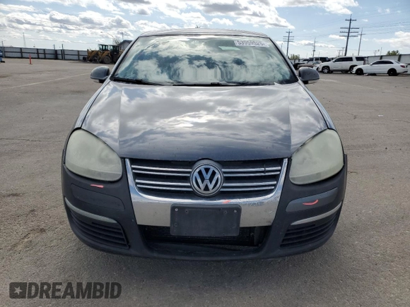2009 Volkswagen Jetta S with VIN 3VWJM71K59M007776, listed as a Copart auction lot 53959525 with 190,557 mi miles and Salvage title. Bid and sale history available at DreamBid. Image 5.
