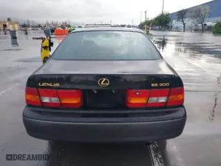 1998 Lexus ES 300 Luxury Sport Sdn with VIN JT8BF28G5W5045062, listed as a IAAI auction lot 41794311 with 220,896 mi miles. Bid and sale history available at carsss.com. Image 16.