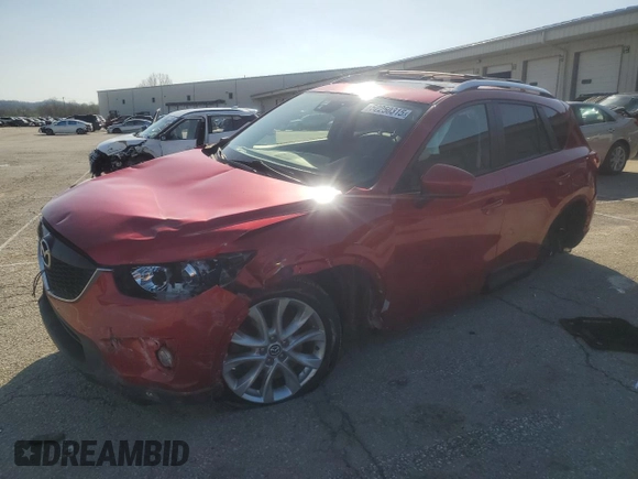 2014 Mazda CX-5 Grand Touring with VIN JM3KE4DY9E0419111, listed as a Copart auction lot 52250315 with 130,003 mi miles and Salvage Title. Bid and sale history available at DreamBid. Image 1.