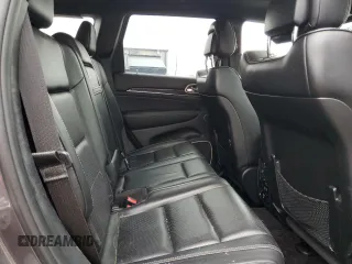 2017 Jeep Grand Cherokee Overland with VIN 1C4RJFCG8HC607872, listed as a Copart auction lot 57493195 with 164,478 mi miles and Salvage title. Bid and sale history available at DreamBid. Image 11.