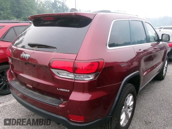2021 Jeep Grand Cherokee Laredo X with VIN 1C4RJFAG3MC611583, listed as a IAAI auction lot 42631284 with 99,457 mi miles and . Bid and sale history available at DreamBid. Image 7.