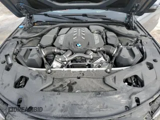 2024 BMW 8 Series M850i xDrive z VIN WBABC4C0XRCN56084, wystawiony jako Copart lot #86747974 z przebiegiem Nie podano mil oraz Szkody całkowita. Historia ofert i sprzedaży dostępna na DreamBid. Obrazek 11.