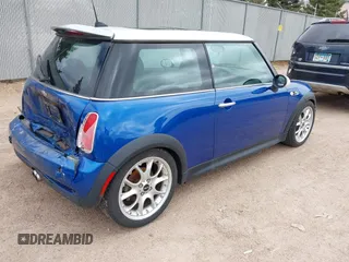 2006 MINI Hardtop S with VIN WMWRE33516TL22491, listed as a IAAI auction lot 42134690 with 163,912 mi miles and . Bid and sale history available at DreamBid. Image 4.