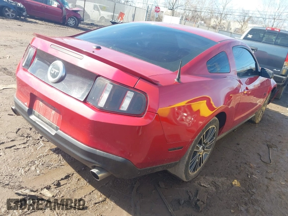 2010 Ford Mustang GT with VIN 1ZVBP8CH9A5121129, listed as a IAAI auction lot 41688528 with 113,089 mi miles. Bid and sale history available at carsss.com. Image 4.