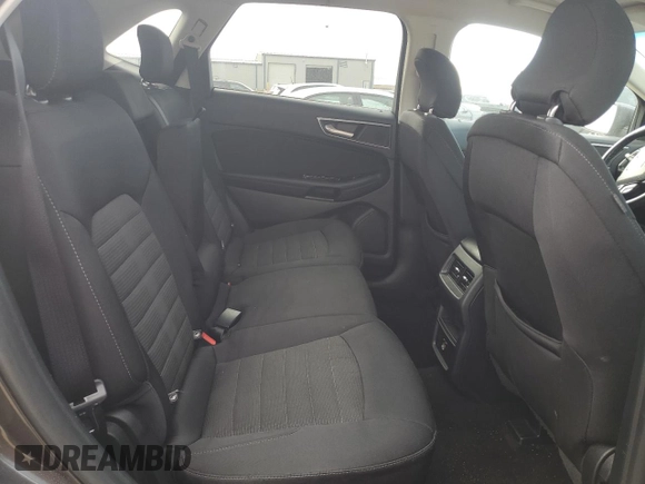 2019 Ford Edge SEL z VIN 2FMPK4J94KBB70789, wystawiony jako Copart lot #52565675 z przebiegiem 82 888 mil mil oraz Szkoda całkowita • Salvage title. Historia ofert i sprzedaży dostępna na DreamBid. Obrazek 11.