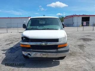 2014 Chevrolet Express Passenger 1LT with VIN 1GAZGYFG8E1130432, listed as a IAAI auction lot 42487756 with 176,418 mi miles and . Bid and sale history available at DreamBid. Image 12.