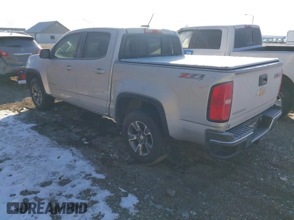 2016 Chevrolet Colorado 4WD Z71 with VIN 1GCGTDE37G1245799, listed as a IAAI auction lot 41408092 with 128,912 mi miles. Bid and sale history available at carsss.com. Image 3.