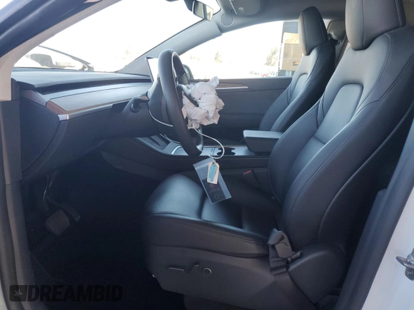 2024 Tesla Model Y Long Range с VIN 7SAYGDEE0RF981488, выставлен на аукционе Copart как лот 58704135 с пробегом 21 417 миль миль и Списание • Salvage title. История ставок и продаж доступна на DreamBid. Изображение 7.