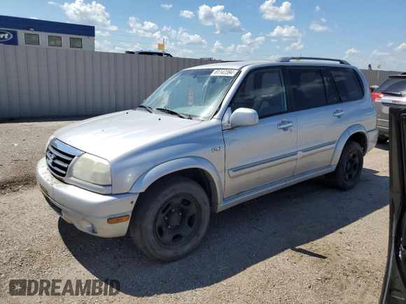 2002 Suzuki XL7 Standard z VIN JS3TX92V224107201, wystawiony jako Copart lot #61142394 z przebiegiem Nie podano mil oraz Szkoda całkowita • Salvage title. Historia ofert i sprzedaży dostępna na DreamBid. Obrazek 1.
