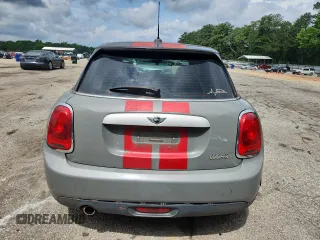 2015 MINI Hardtop 4 Door with VIN WMWXS5C5XFT831555, listed as a Copart auction lot 61673485 with 104,120 mi miles and Salvage title. Bid and sale history available at DreamBid. Image 6.