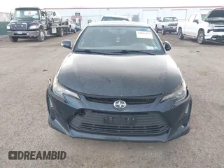 2015 Scion tC with VIN JTKJF5C7XFJ001662, listed as a IAAI auction lot 41843123 with 128,851 mi miles. Bid and sale history available at carsss.com. Image 12.