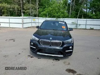 2018 BMW X1 xDrive28i with VIN WBXHT3C31J5L24230, listed as a Copart auction lot 56665305 with Not provided miles and Non repairable. Bid and sale history available at DreamBid. Image 13.