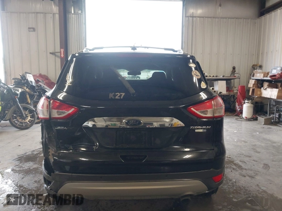 2015 Ford Escape Titanium with VIN 1FMCU9J98FUC70495, listed as a IAAI auction lot 41978543 with 129,974 mi miles. Bid and sale history available at carsss.com. Image 16.