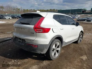 2024 Volvo XC40 Core Bright Theme with VIN YV4L12UK0R2260737, listed as a IAAI auction lot 41433709 with 20,984 mi miles. Bid and sale history available at carsss.com. Image 4.