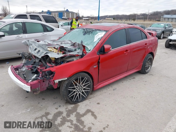 2016 Mitsubishi Lancer GT with VIN JA32U8FW1GU012988, listed as a IAAI auction lot 41498905 with 94,727 mi miles. Bid and sale history available at carsss.com. Image 2.