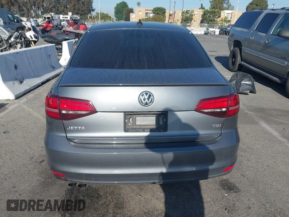2016 Volkswagen Jetta Sport z VIN 3VWD17AJ0GM386504, wystawiony jako IAAI lot #42000125 z przebiegiem 90 405 mil mil oraz . Historia ofert i sprzedaży dostępna na DreamBid. Obrazek 16.